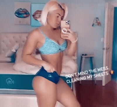 Woman In Blue Bikini Taking Selfie GIF