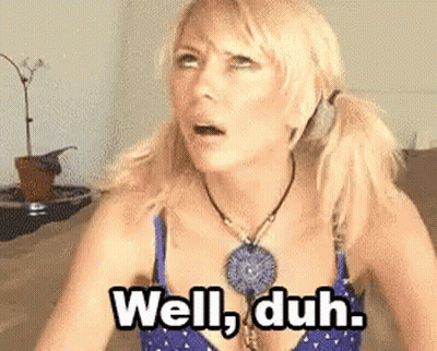 Woman In Blue Bra And Necklace On Couch GIF