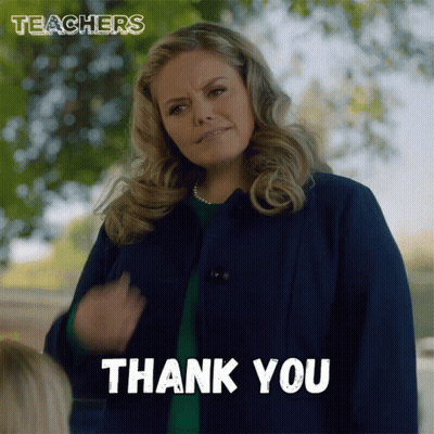 Woman In Blue Coat Saying Thank You GIF