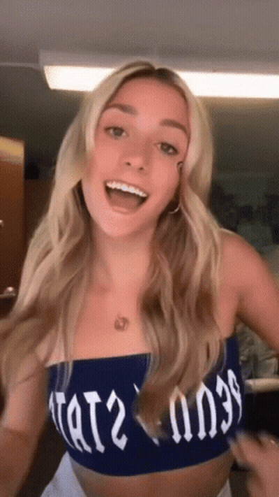 Woman In Blue Crop Top Saying Tat2 GIF