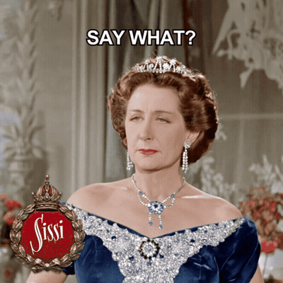 Woman In Blue Dress And Tiara Saying Say What GIF