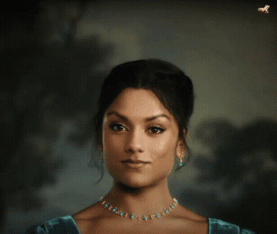 Woman In Blue Dress And Turquoise Necklace GIF