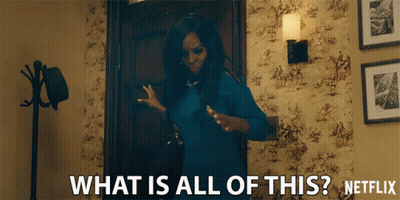 Woman In Blue Dress Asking What Is All This On Netflix GIF