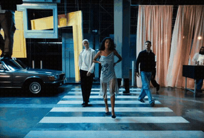 Woman In Blue Dress Crossing Crosswalk GIF