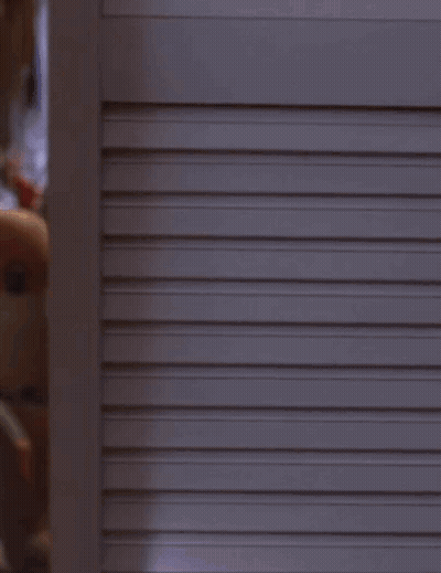 Woman In Blue Dress Dancing In Dark GIF
