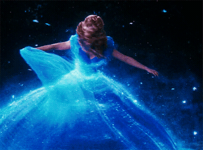 Woman In Blue Dress Dancing In Dark GIF