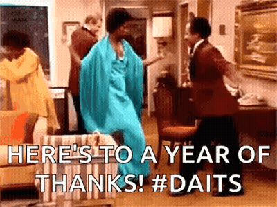 Woman In Blue Dress Dancing In Living Room GIF