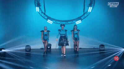 Woman In Blue Dress Dancing On Stage GIF