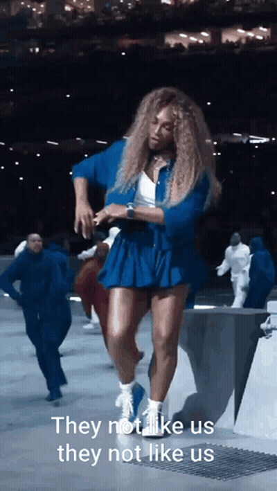 Woman In Blue Dress Dancing With Text GIF