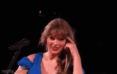 Woman In Blue Dress Giving Middle Finger GIF