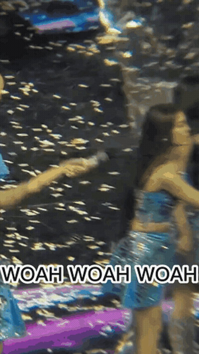 Woman In Blue Dress Holding Hand Saying Woah Woah Woah GIF