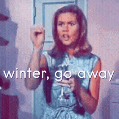 Woman In Blue Dress Holding Wine Making Funny Face GIF