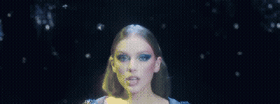 Woman In Blue Dress In Dark Room GIF