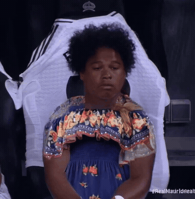 Woman In Blue Dress In Front Of Real Madrid Jersey GIF