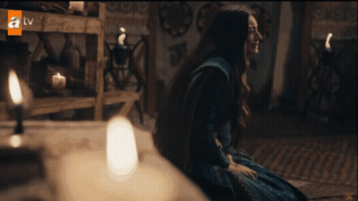 Woman In Blue Dress In Front Of TV GIF