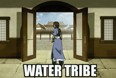 Woman In Blue Dress In Front Of Water Tribe Door GIF