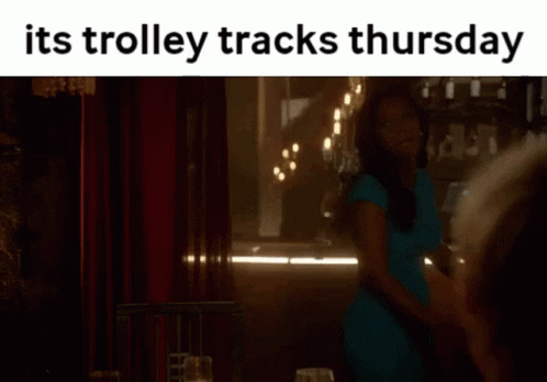 Woman In Blue Dress Its Trolley Tracks Thursday GIF
