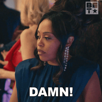 Woman In Blue Dress Making Damn Sign GIF