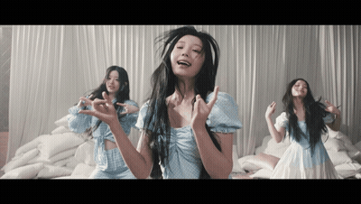 Woman In Blue Dress Making Funny Face GIF