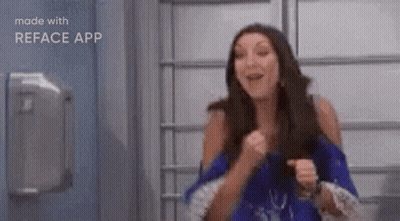 Woman In Blue Dress Making Funny Face GIF