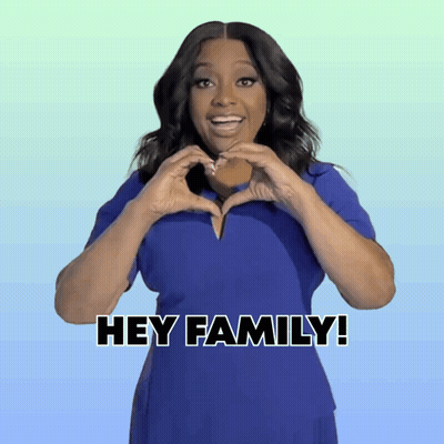 Woman In Blue Dress Making Heart GIF