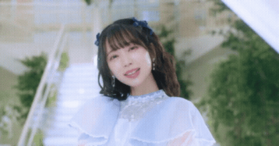 Woman In Blue Dress On Stairs GIF