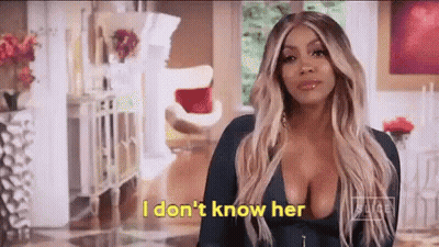 Woman In Blue Dress Saying I Don't Know Her GIF