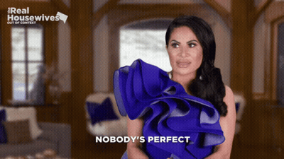Woman In Blue Dress Saying Nobody's Perfect GIF