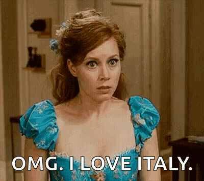 Woman In Blue Dress Saying OMG I Love Italy GIF
