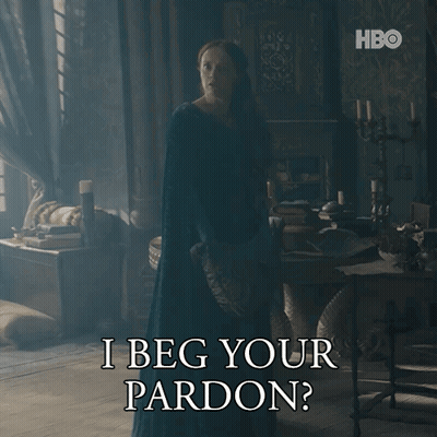 Woman In Blue Dress Says I Beg Your Pardon GIF