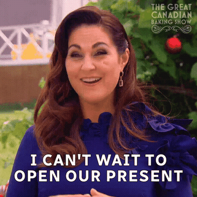 Woman In Blue Dress Says I Can't Wait To Open Our Present GIF