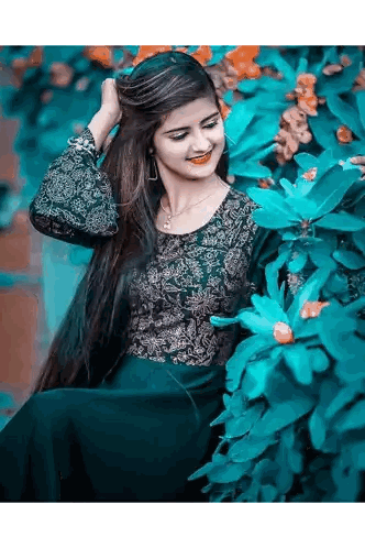 Woman In Blue Dress Sitting Next To Tree Sticker
