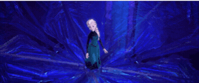 Woman In Blue Dress Standing In Dark Room Surrounded By Water GIF