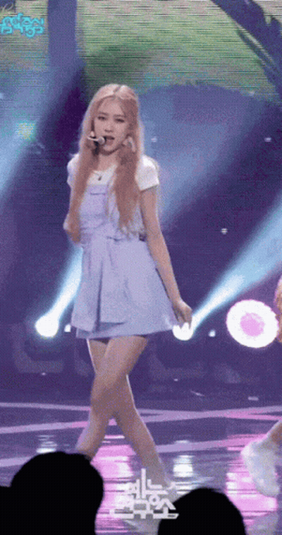 Woman In Blue Dress Standing On Stage GIF