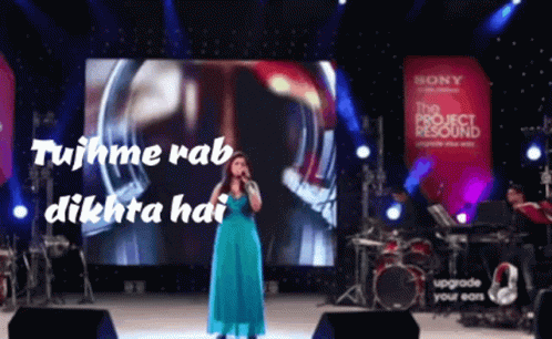 Woman In Blue Dress Standing On Stairs GIF