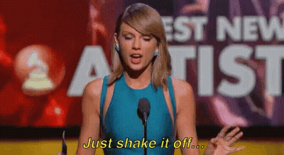 Woman In Blue Dress Talking At Microphone GIF