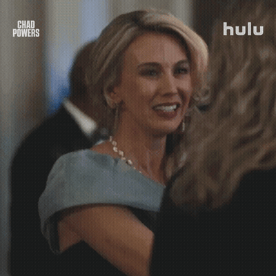 Woman In Blue Dress Talking In Hulu Advertisement GIF