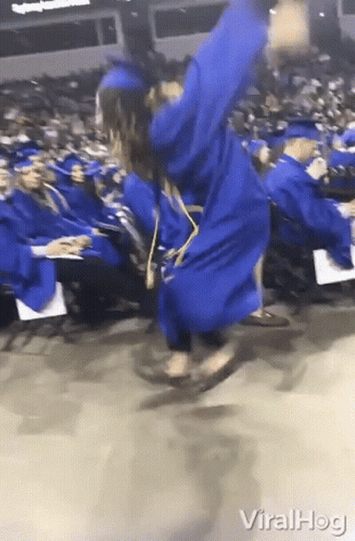 Woman In Blue Graduation Gown Jumping GIF