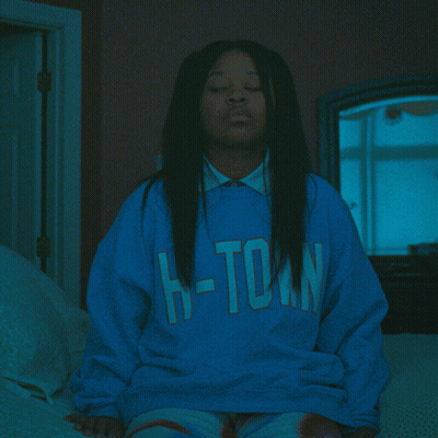 Woman In Blue H-Town Sweatshirt Looking Up GIF