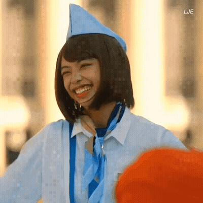 Woman In Blue Hat And Blue Tie With LJE GIF