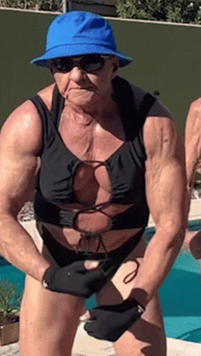Woman In Blue Hat And Sunglasses At Pool GIF