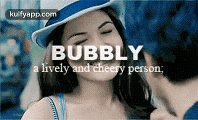 Woman In Blue Hat Kissed By Man With Bubbly GIF