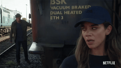 Woman in Blue Hat Next to Train Saying Vacuum Braked Dual Heated Eth 3