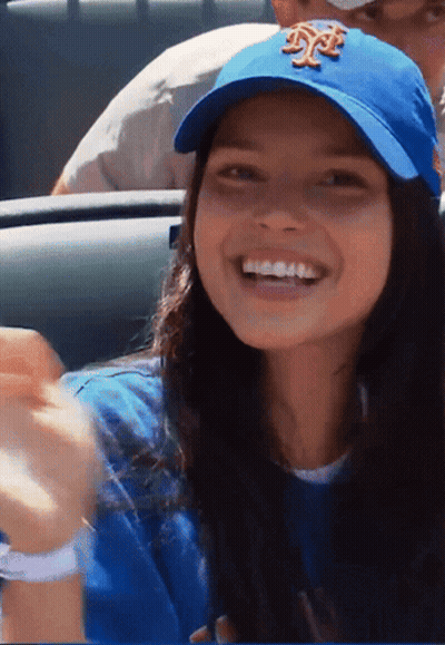 Woman In Blue Hat With NY Smiling GIF