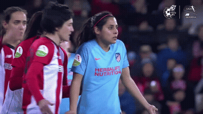 Woman In Blue Herbalife Nutrition Shirt With Teammates GIF