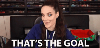 Woman In Blue Hoodie Smiling Says Goal GIF