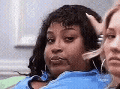 Woman In Blue Jacket Beside Another Woman GIF