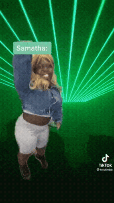 Woman In Blue Jacket Dancing With Lasers GIF