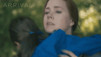 Woman In Blue Jacket Hugging Girl With Arrival GIF