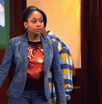 Woman In Blue Jacket Next To Man In Yellow Plaid Shirt GIF